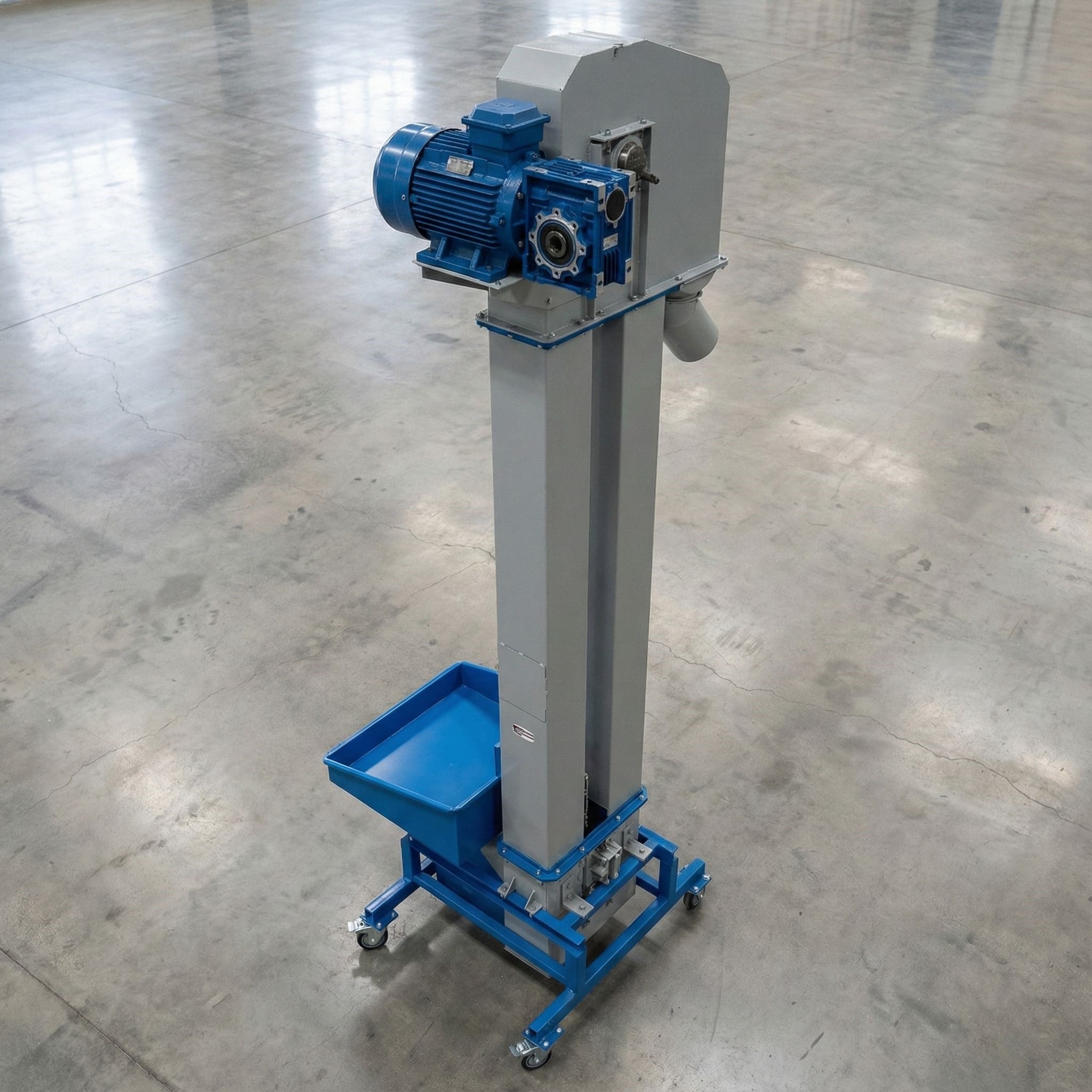 Bucket elevator lifting grains or powders vertically in a food processing facility