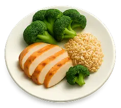 Teller mit Hähnchen, Brokkoli und Reis – Beispiel für ausgewogene Anatomie-Rezepte mit klarer Makronährstoffverteilung.