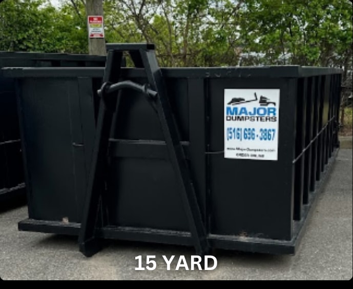 Large black commercial dumpster with company branding outdoors - Major Dumpsters Inc., Long Island