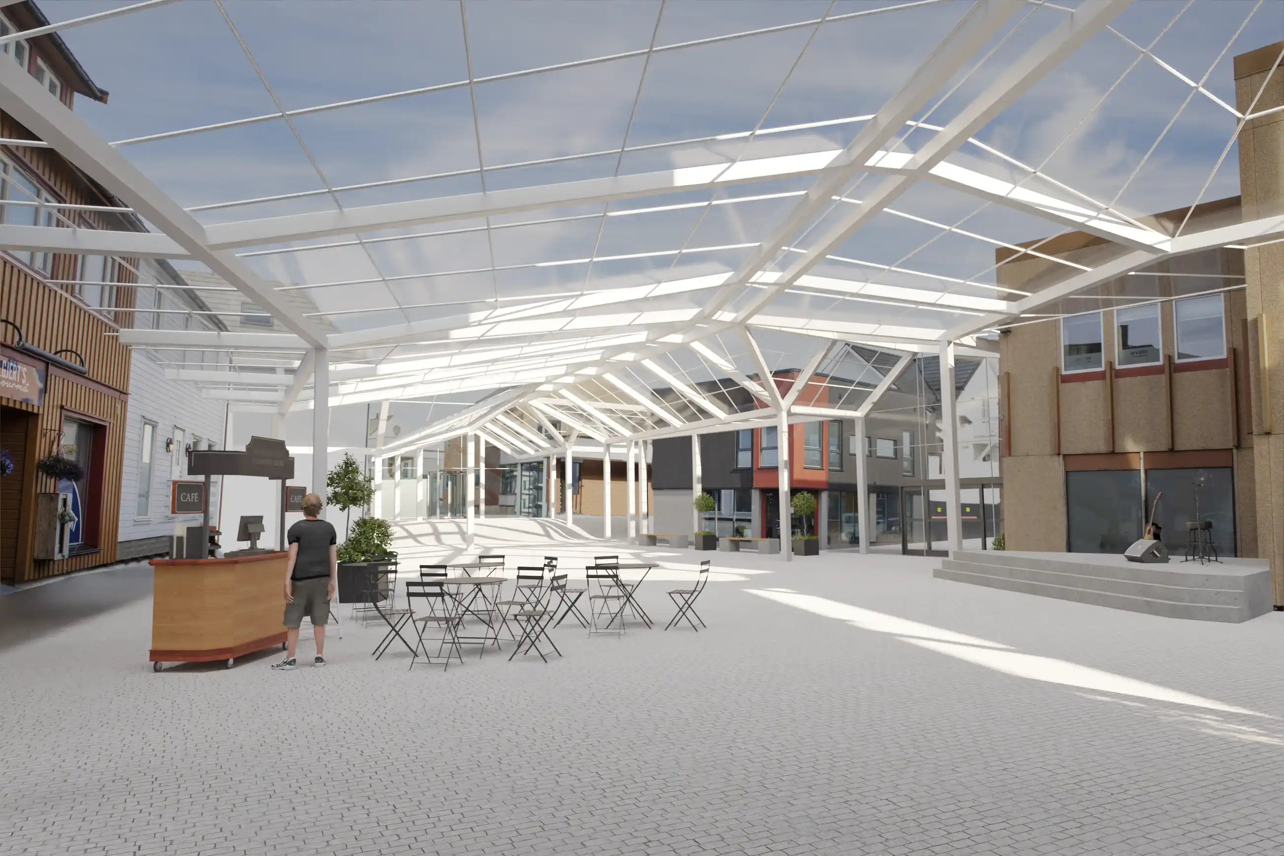 Moderne utendørs gågate med gjennomsiktig tak, kafeområde med bord og stoler, og en liten scene med mikrofon og gitar.