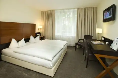 Enjoy Doppelzimmer, Zubereitungsmöglichkeit für Kaffee und Tee, Safe, LCD-TV, kostenfreies Fitnesscenter, kostenfreies WLAN