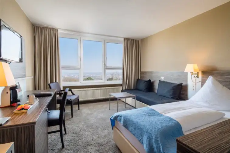 Cosy Einzelzimmer, Zubereitungsmöglichkeit für Kaffee und Tee, Safe, LCD-TV, kostenfreies Fitnesscenter, kostenfreies WLAN 