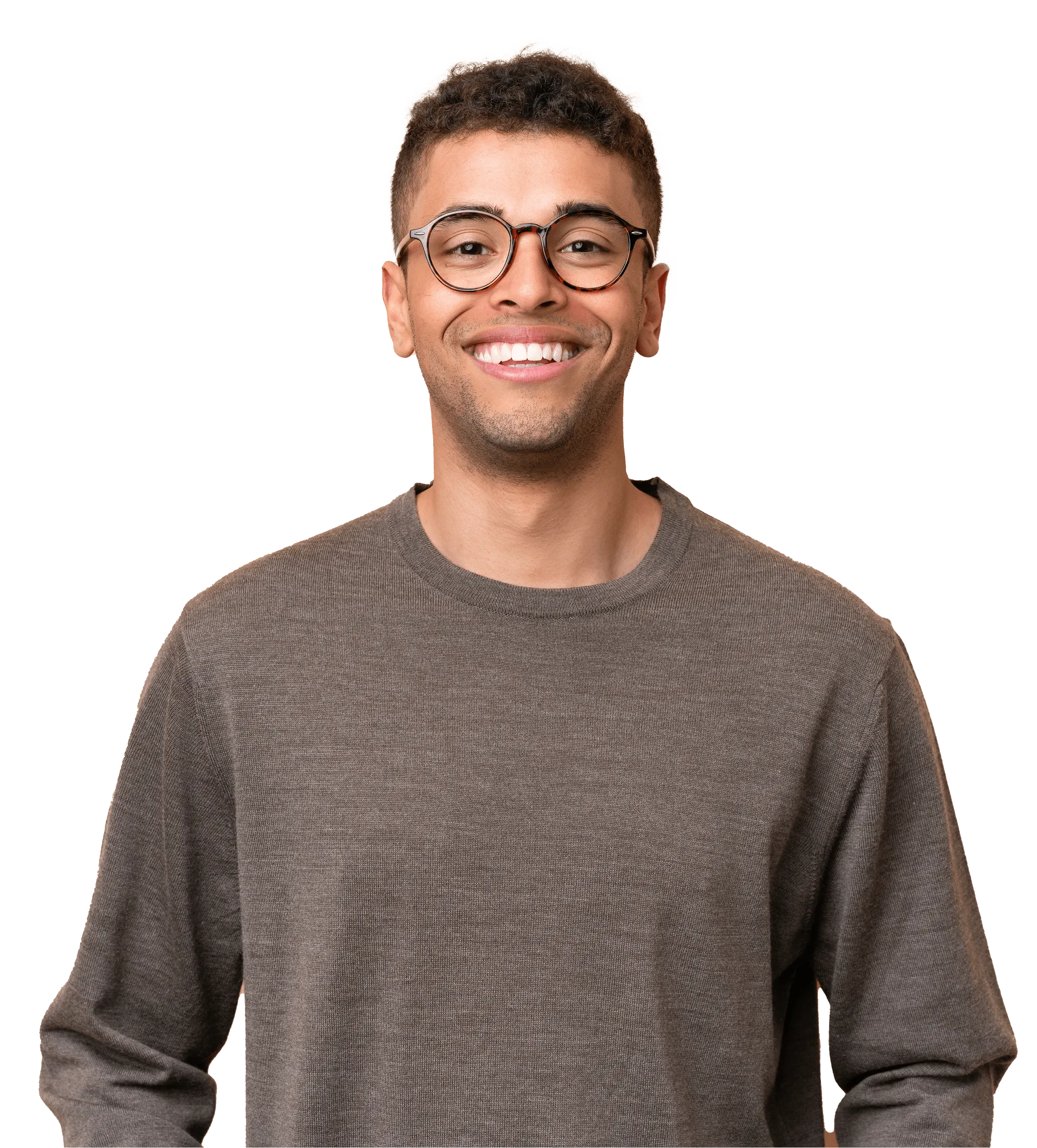 Smiling young man with curly hair wearing glasses and a brown sweater.