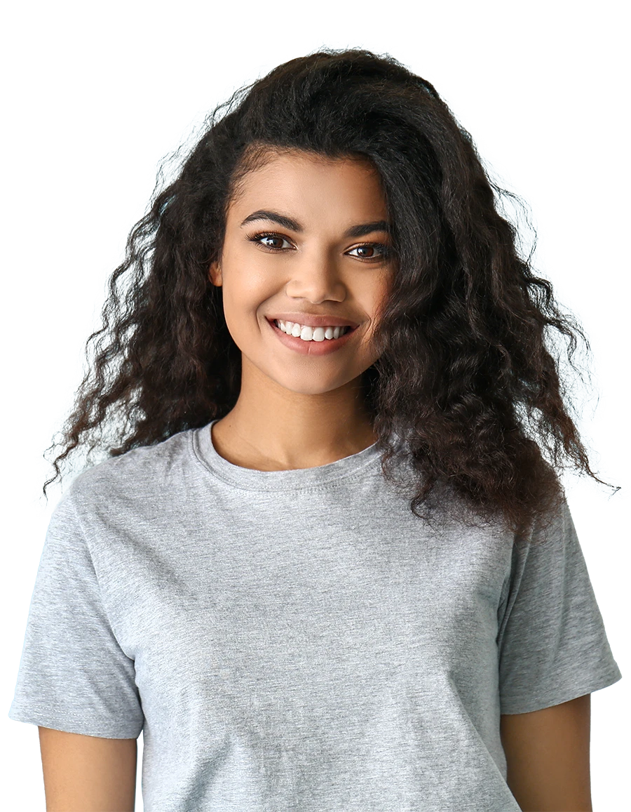 Smiling woman with curly hair wearing a light gray t-shirt.