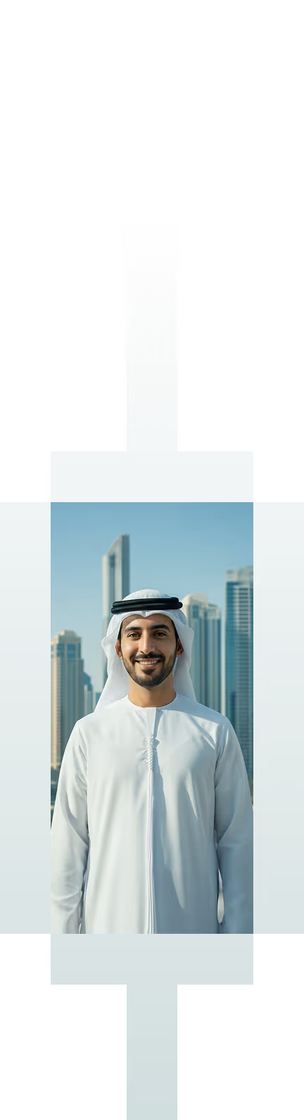 Smiling man wearing traditional Emirati clothing standing with modern skyscrapers in the background.