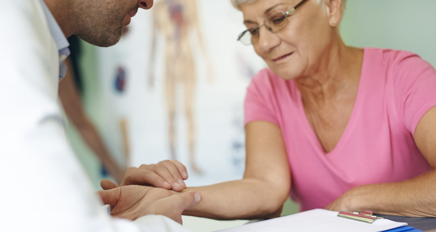 Patient receiving personalized care during a medical consultation, representing concierge healthcare services and the best primary care doctor in Great Neck.