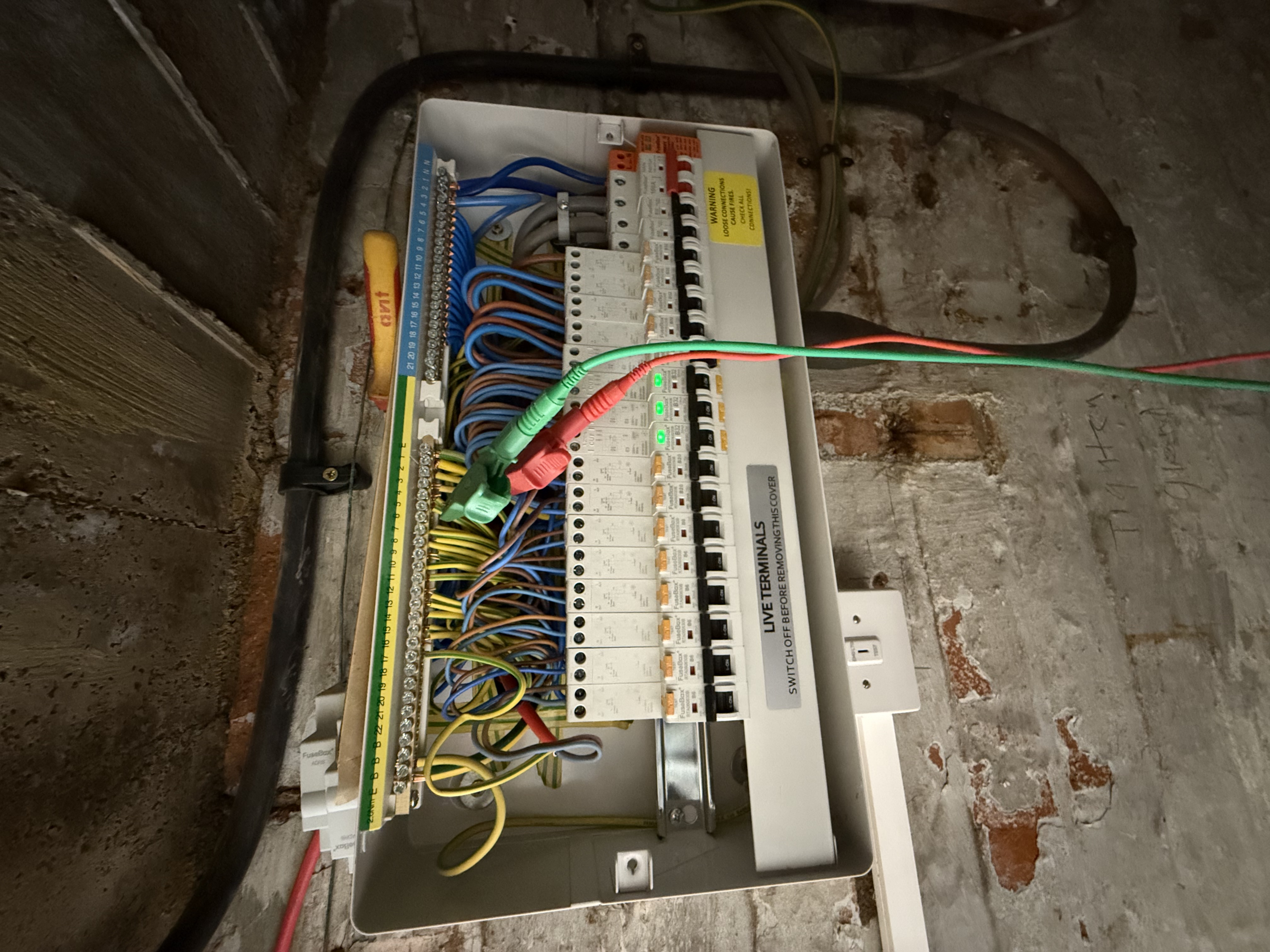 Kinetic Elec electrician van parked on a quiet residential street in Derby, UK at dusk.