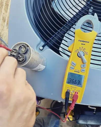 technician installaing an ac