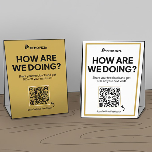 Two table tents with QRs for scanning