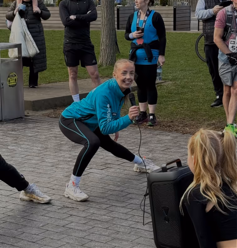 Picture of Liv leading a class warm up