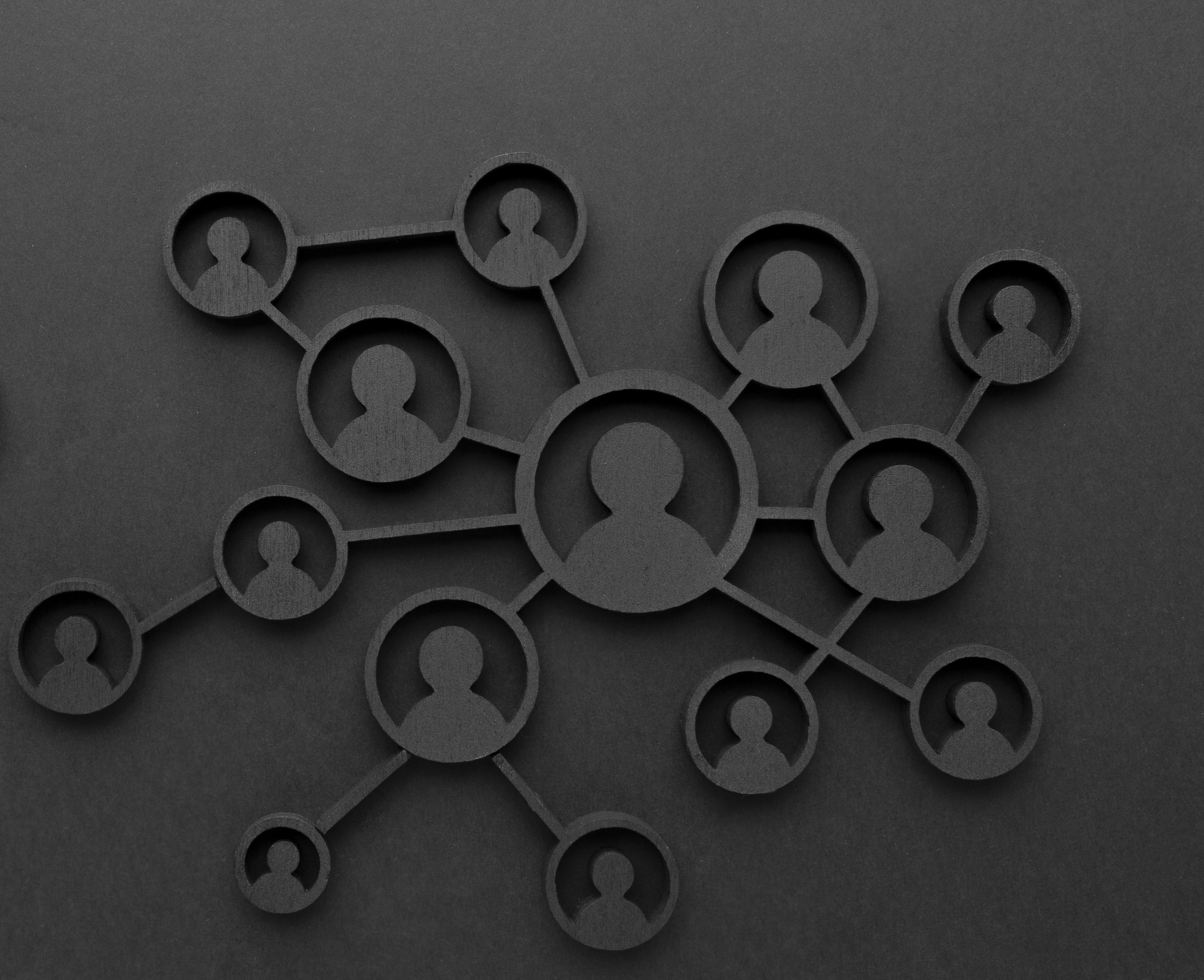 Black 3D network of connected user icons representing web3 community or decentralized autonomous organization (DAO)