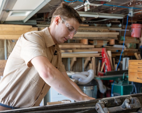 Dean Dauplaise Working in his Shop
