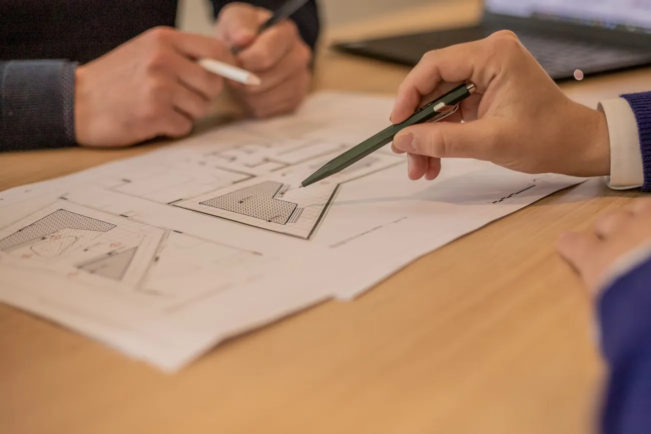 Team meeting over drawing