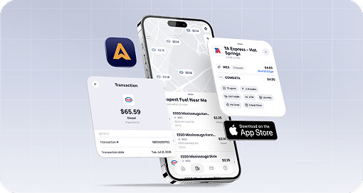 The Nomad Fuel app dashboard open on a phone held in both hands