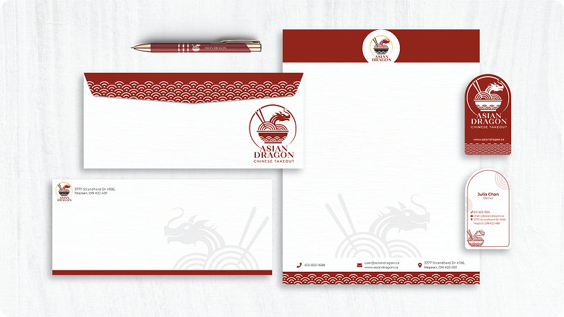 Asian Dragon Chinese takeout branded stationery set including envelopes, letterhead, business cards, and a pen featuring a red dragon and bowl logo with wave patterns.