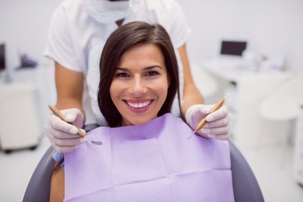 female-patient-smiling-clinic
