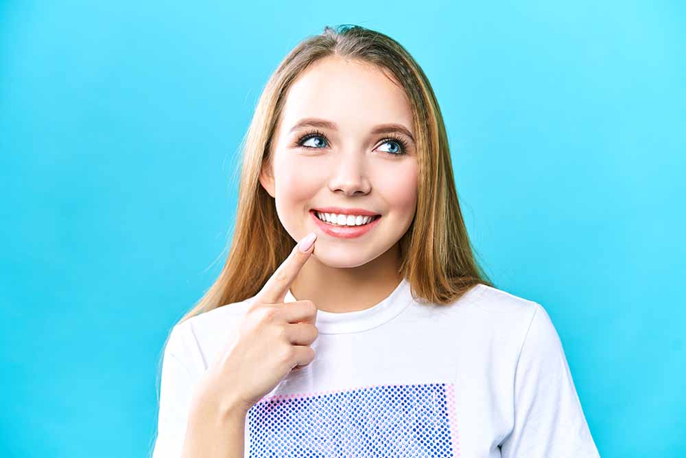 perfect-healthy-teeth-smile-young-woman-dental-dost-dental-blog