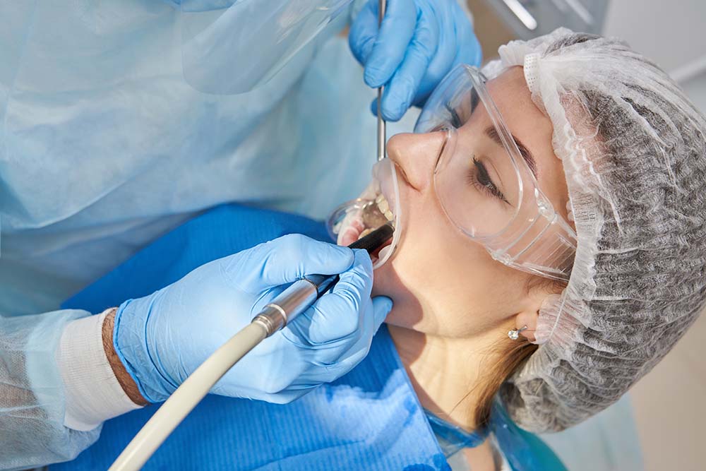 lady-patient-sitting-stomatology-chair-dentist-drilling-tooth-modern-clinic-dental-dost