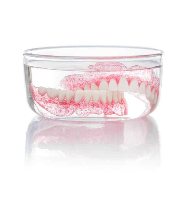 set-dentures-water