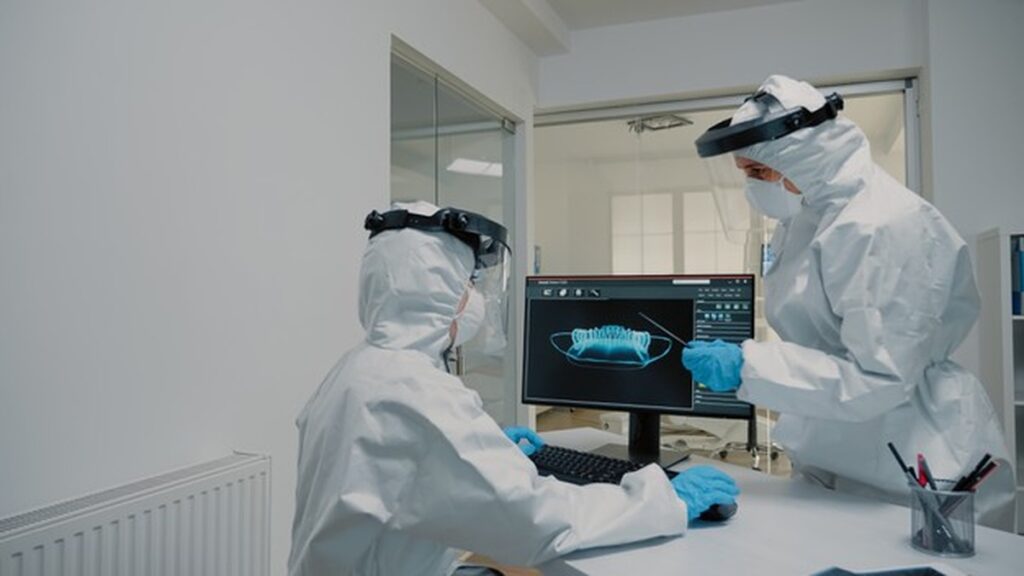 professional-stomatology-team-analyzing-teeth-x-ray