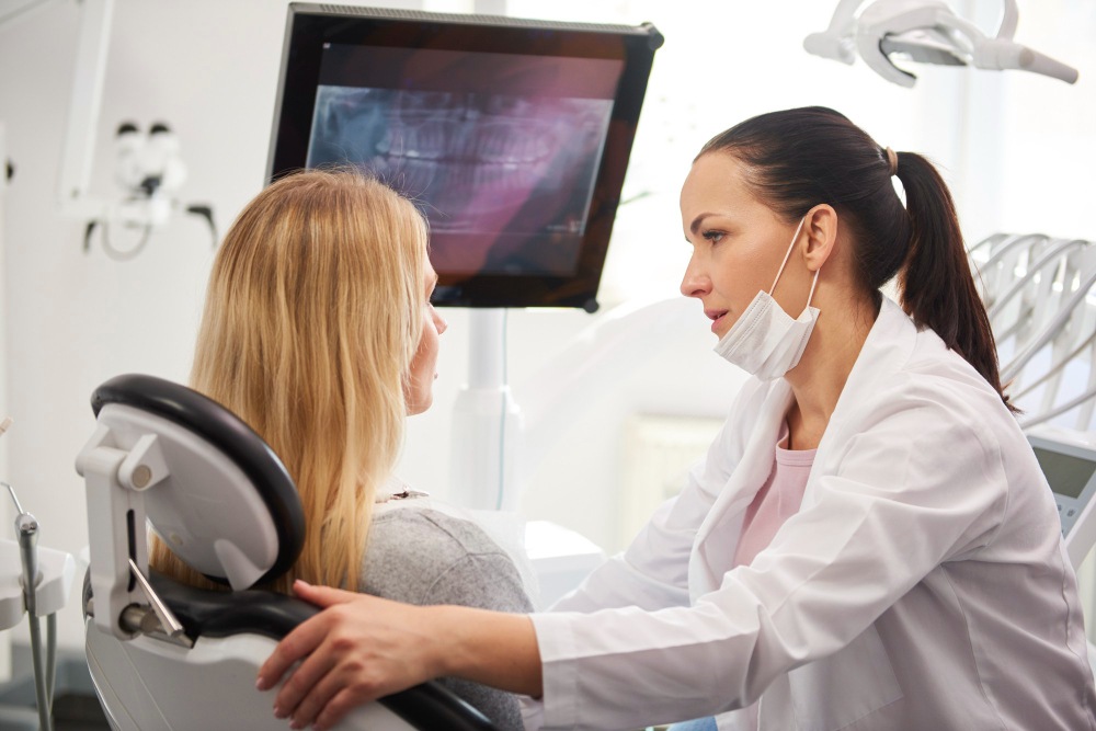 dentist-talking-worried-woman-during-dental-checkup