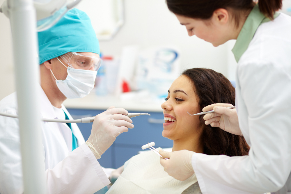 dentist-examining-patient-s-teeth-for-polishing
