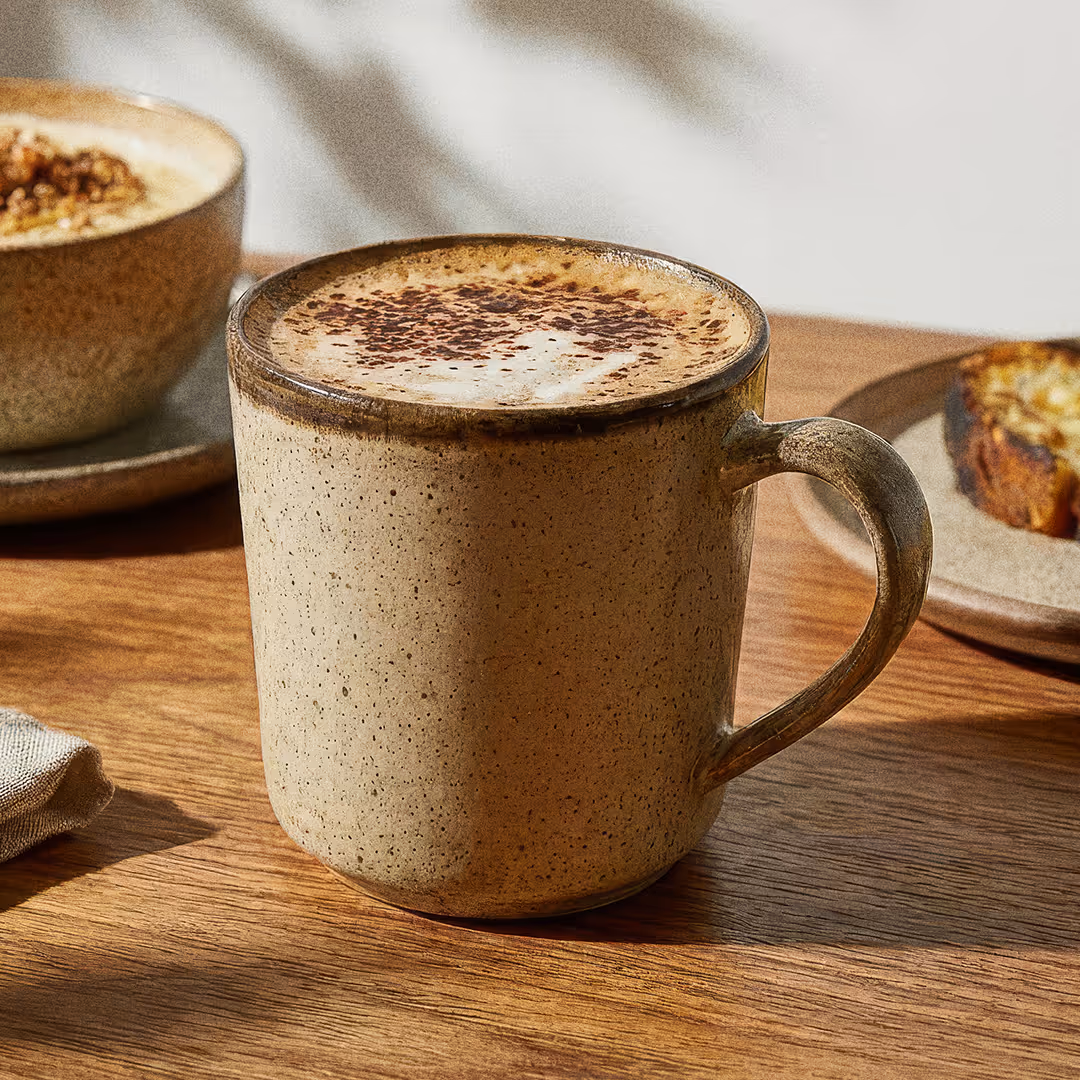 Cappuccino with stable, creamy foam made possible by micellar casein from molecular farming.