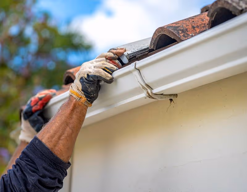 Gutter cleaning at an Orlando residence by Pressure Washing Guys