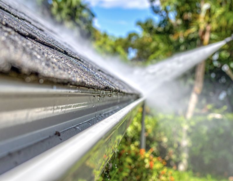 An image of pressure washing gutters in Orlando FL