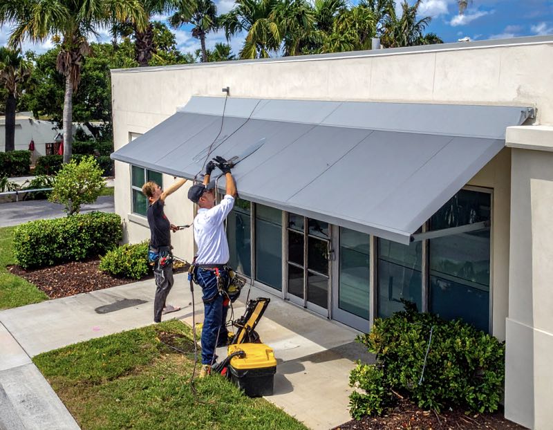 an awning cleaning being done in Orlando by Pressure Washing Guys