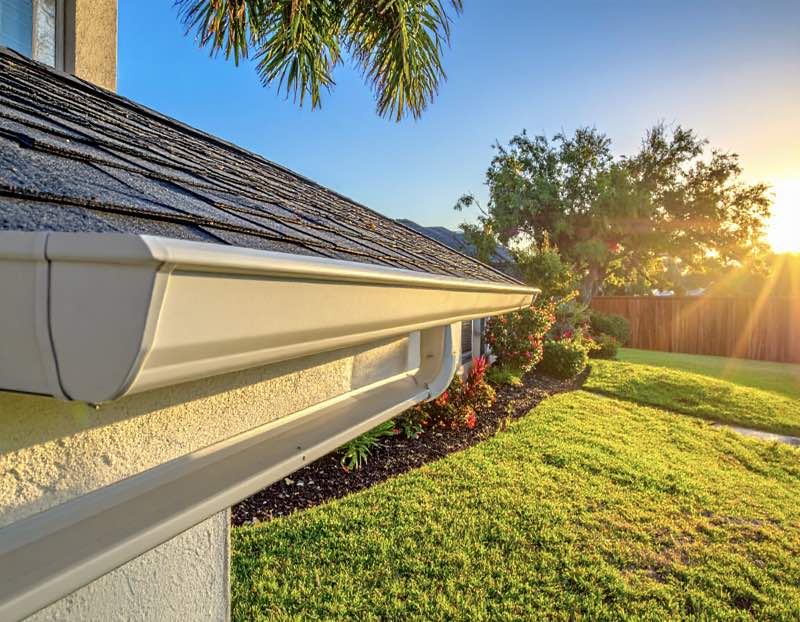 An image of a clean gutter with sunlight coming past, in Orlando FL