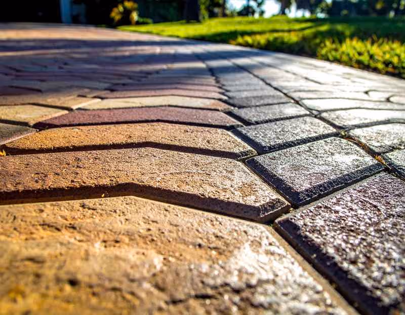 Close-up of sealed paver surface in Orlando showing protective coating against UV rays and moisture damage