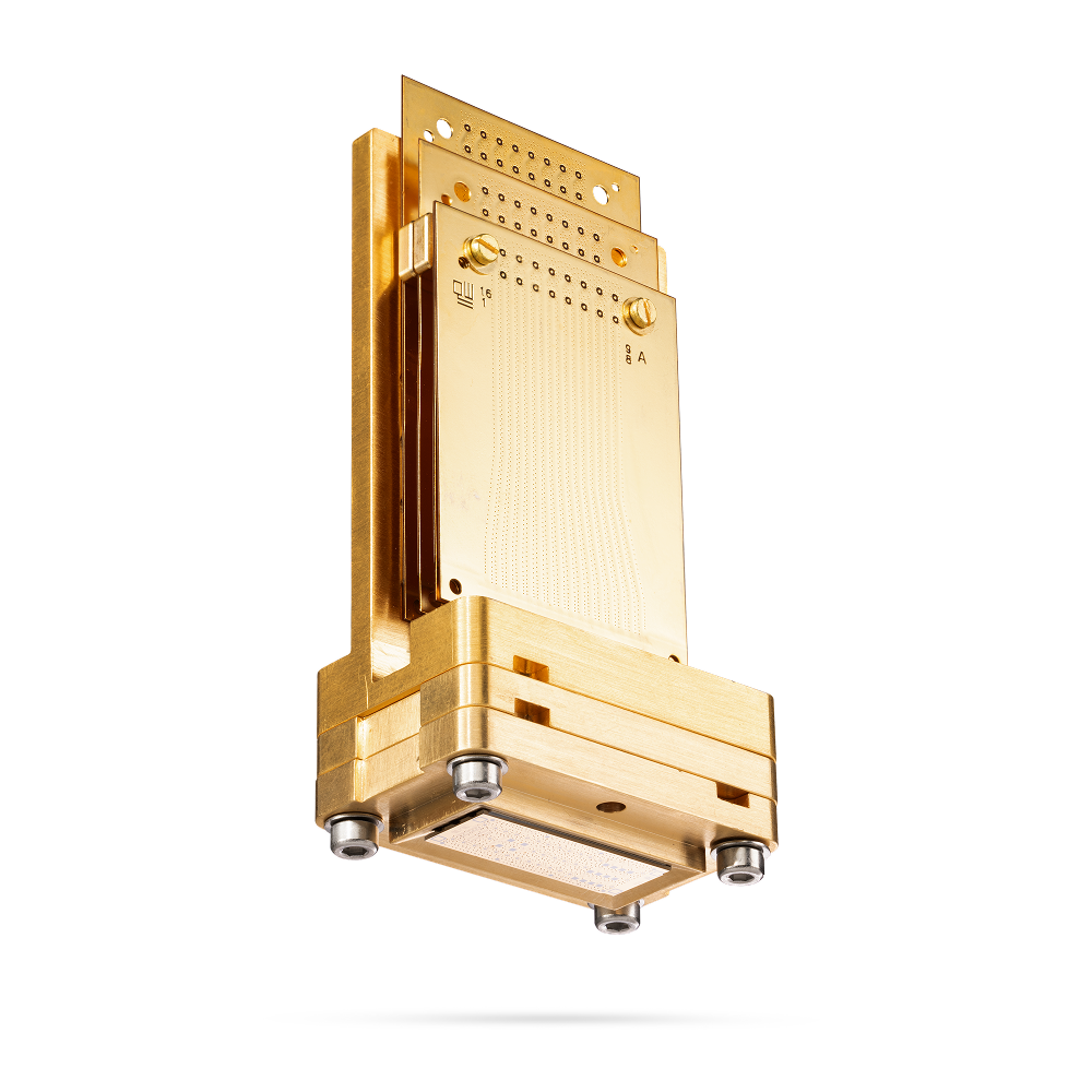 Gold-colored stacked electronic circuit boards with screws and perforated patterns.