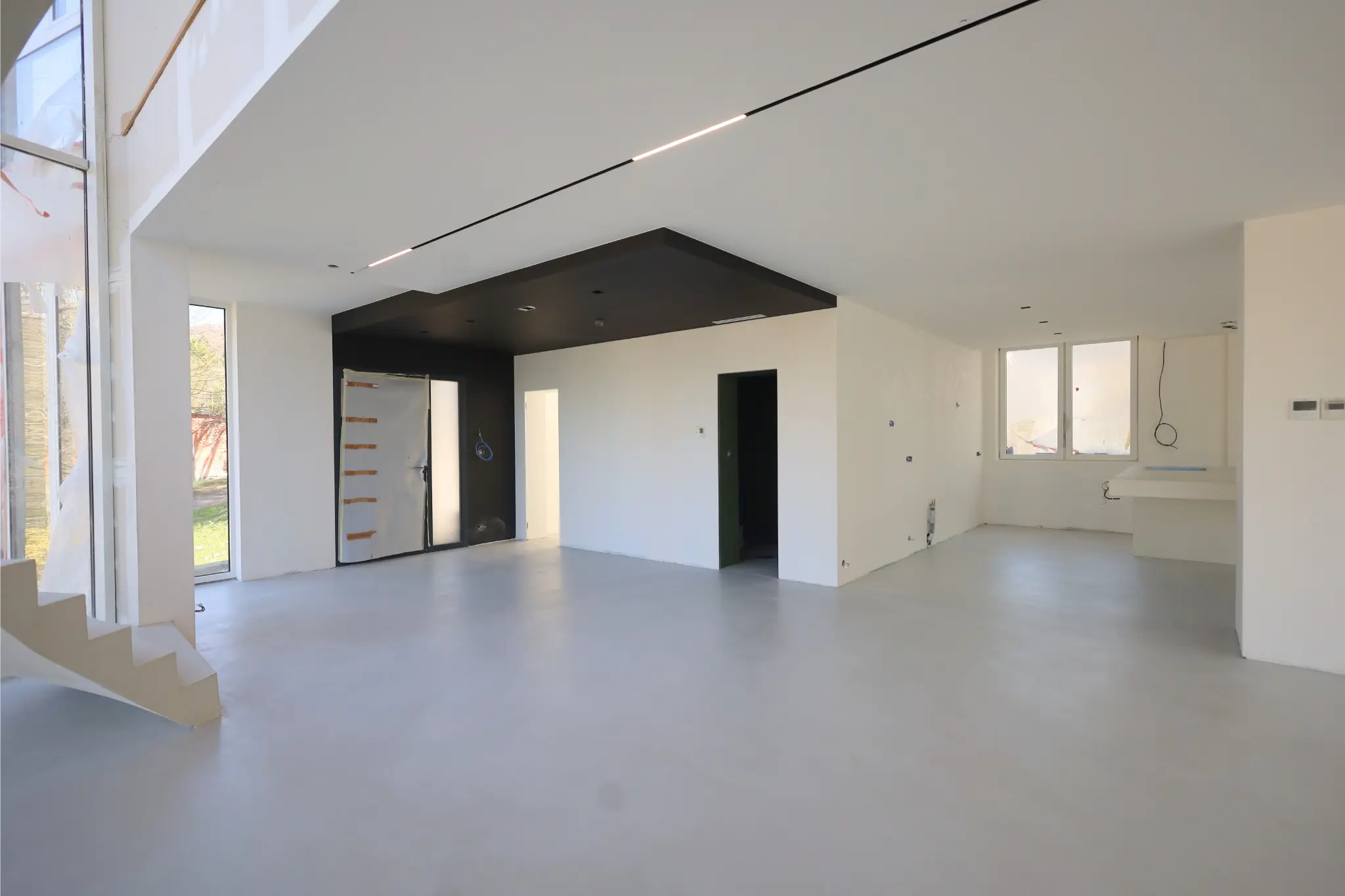 Prix d'un béton ciré à Paris et en Île-de-France pour un salon dans une maison.