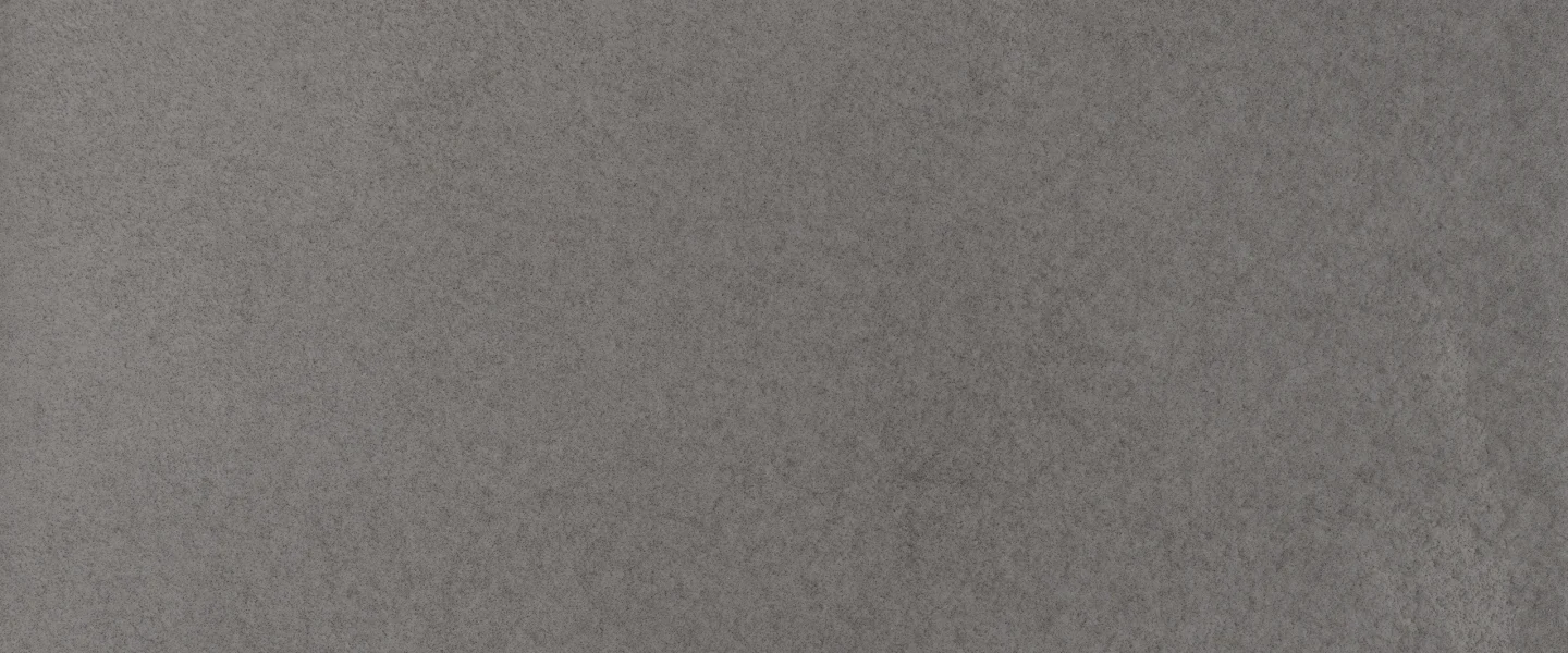 Finition béton ciré AdLucem dans une cuisine moderne à Paris 7ᵉ.