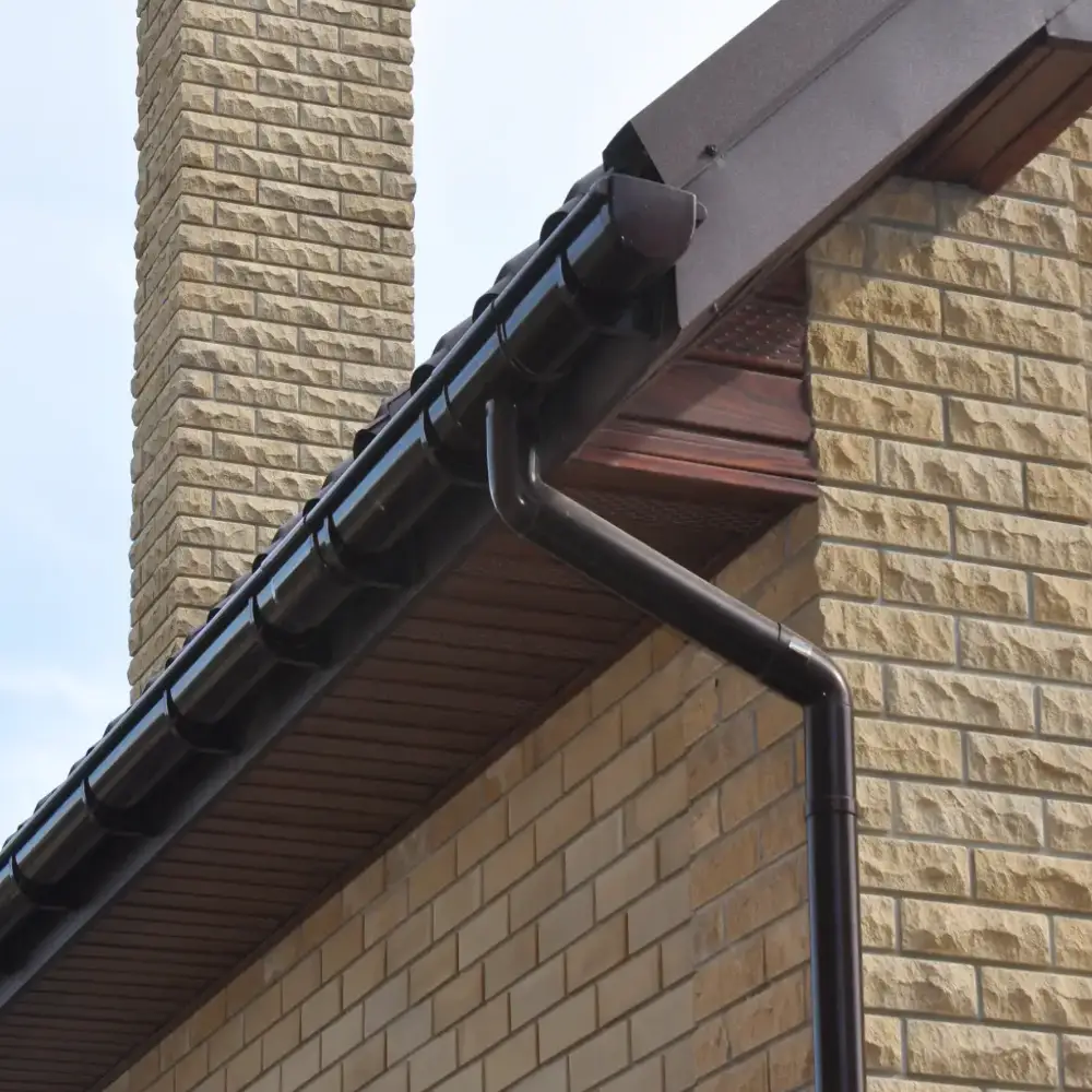 Seamless gutter installation on residential home exterior by Viking Exteriors