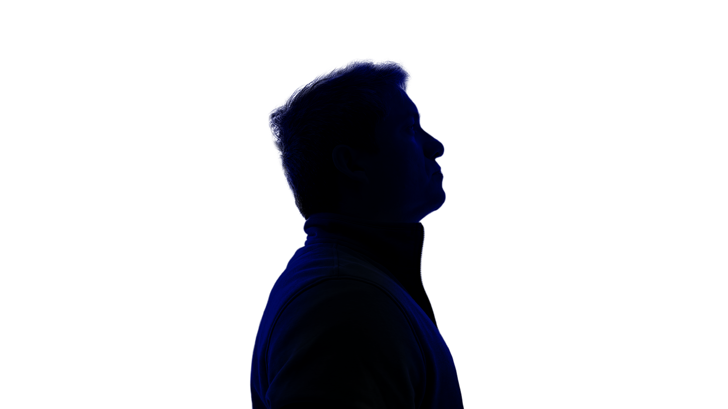 Side profile silhouette of a man against a black background, illuminated with blue lighting.