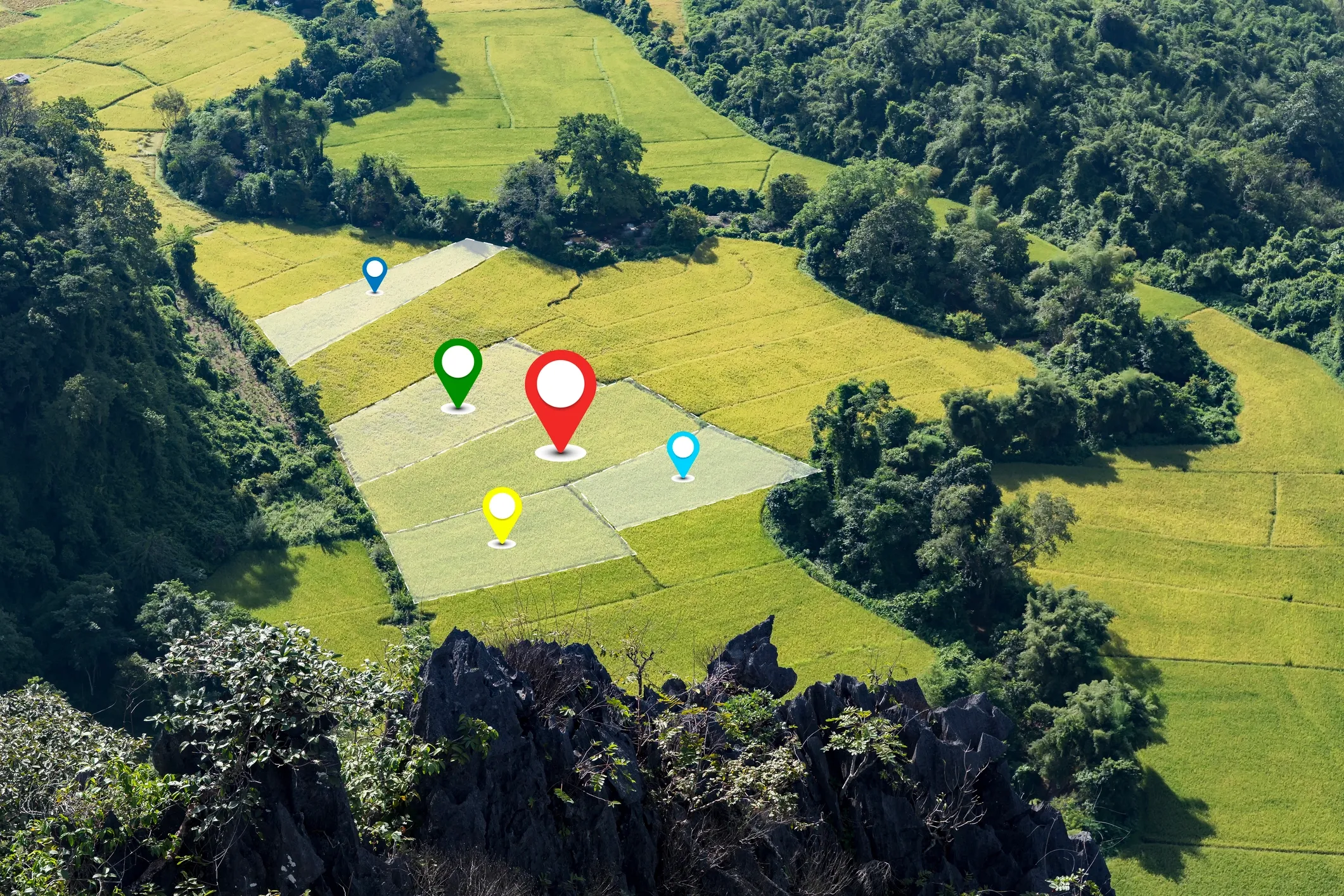 A view of farm land from a drones view in the sky, showing field mapping and surveying.