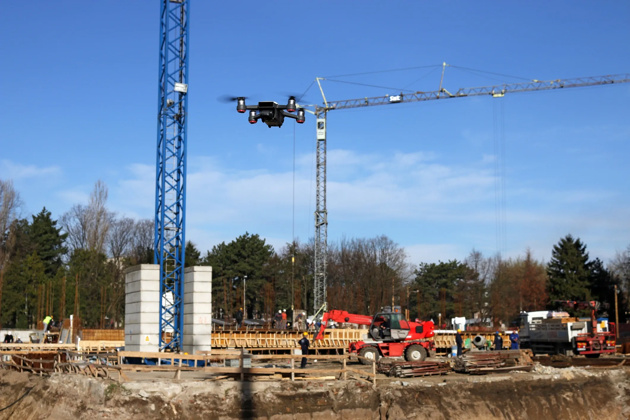 View of a construction site from a drones view, showing materials and drones ability to scout safety or security concerns.