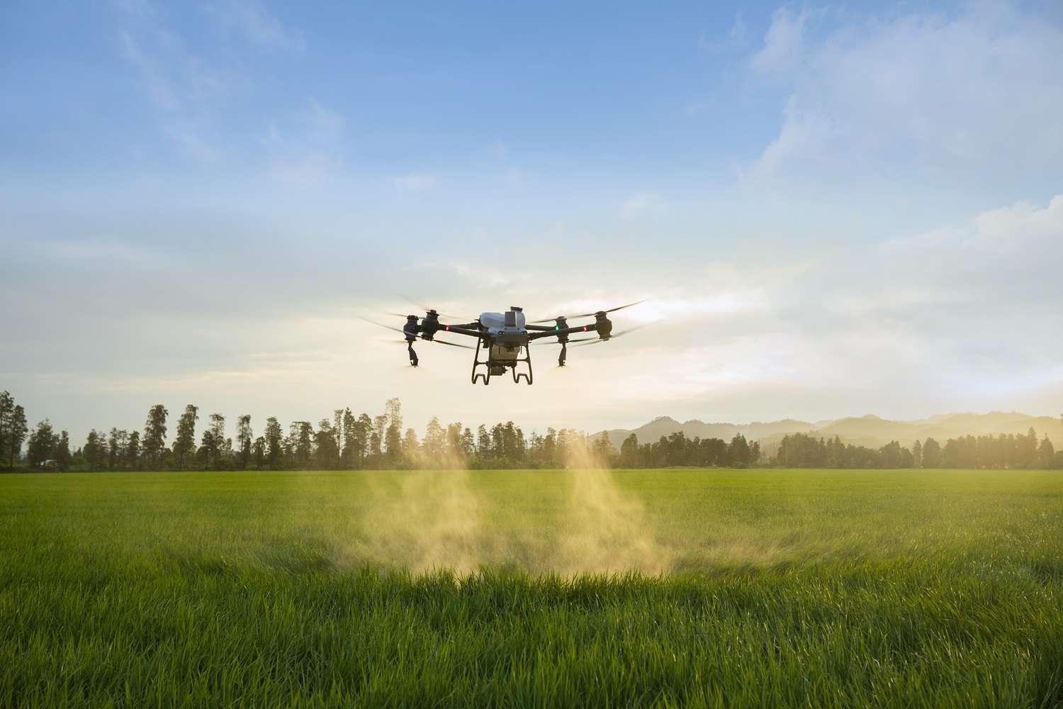 An advanced agriculture spray drone working in a field.