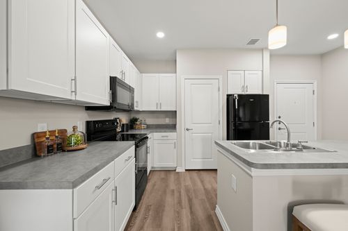 Kitchen with white cabinets