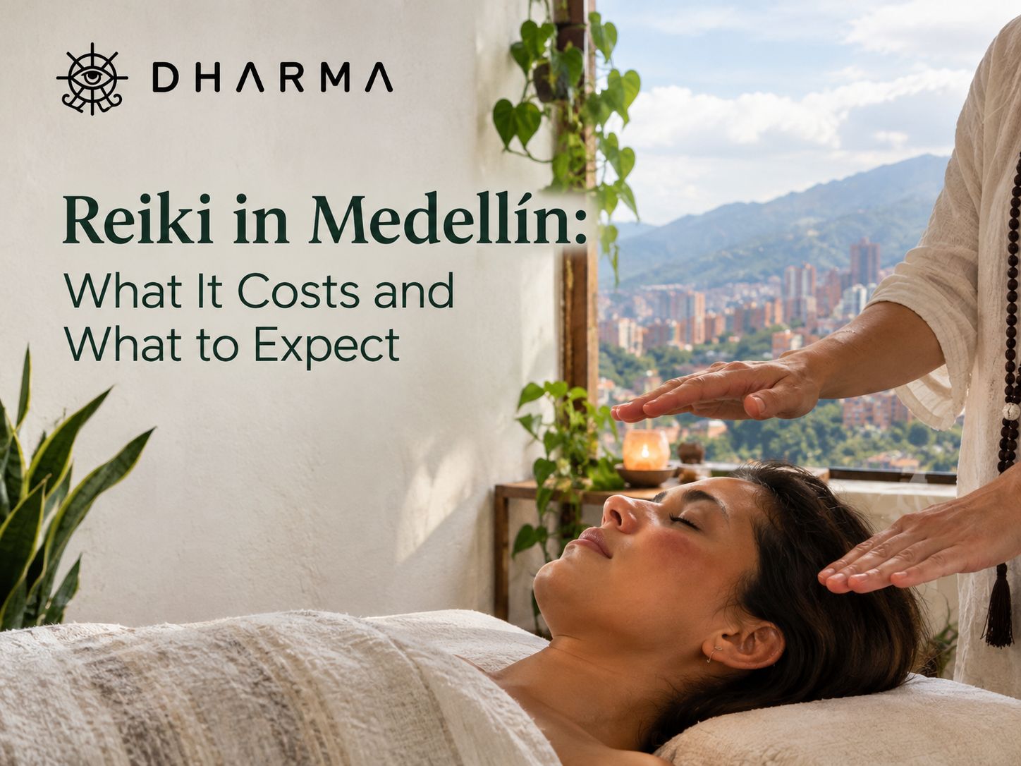 Woman lying on a treatment table with her eyes closed as a Reiki practitioner holds their hands above her, with a Medellín city and mountain view through the window