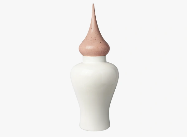 White ceramic vase with a tall, pointed, speckled pink lid.