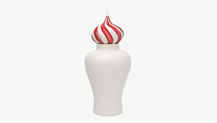 White ceramic jar with a lid shaped like a red and white swirled peppermint candy.