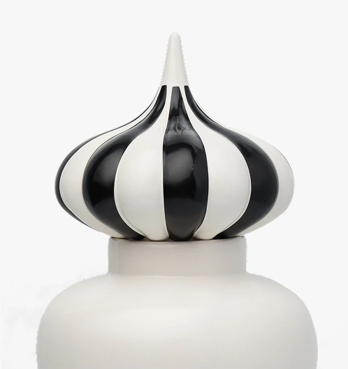 White ceramic container with a black and white striped, pointed bulb-shaped lid.