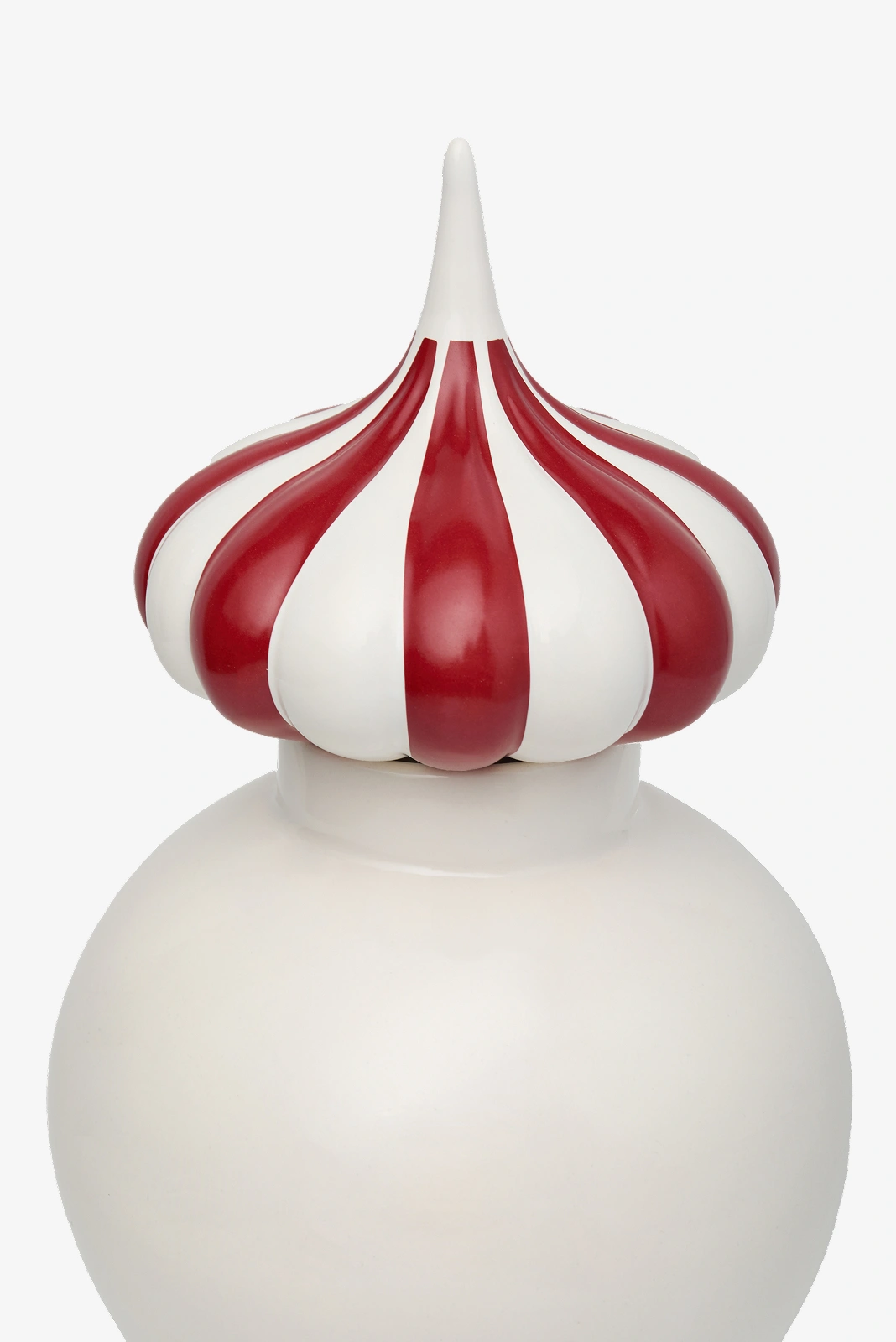 White decorative container with a red and white striped pointed lid resembling a circus tent top.