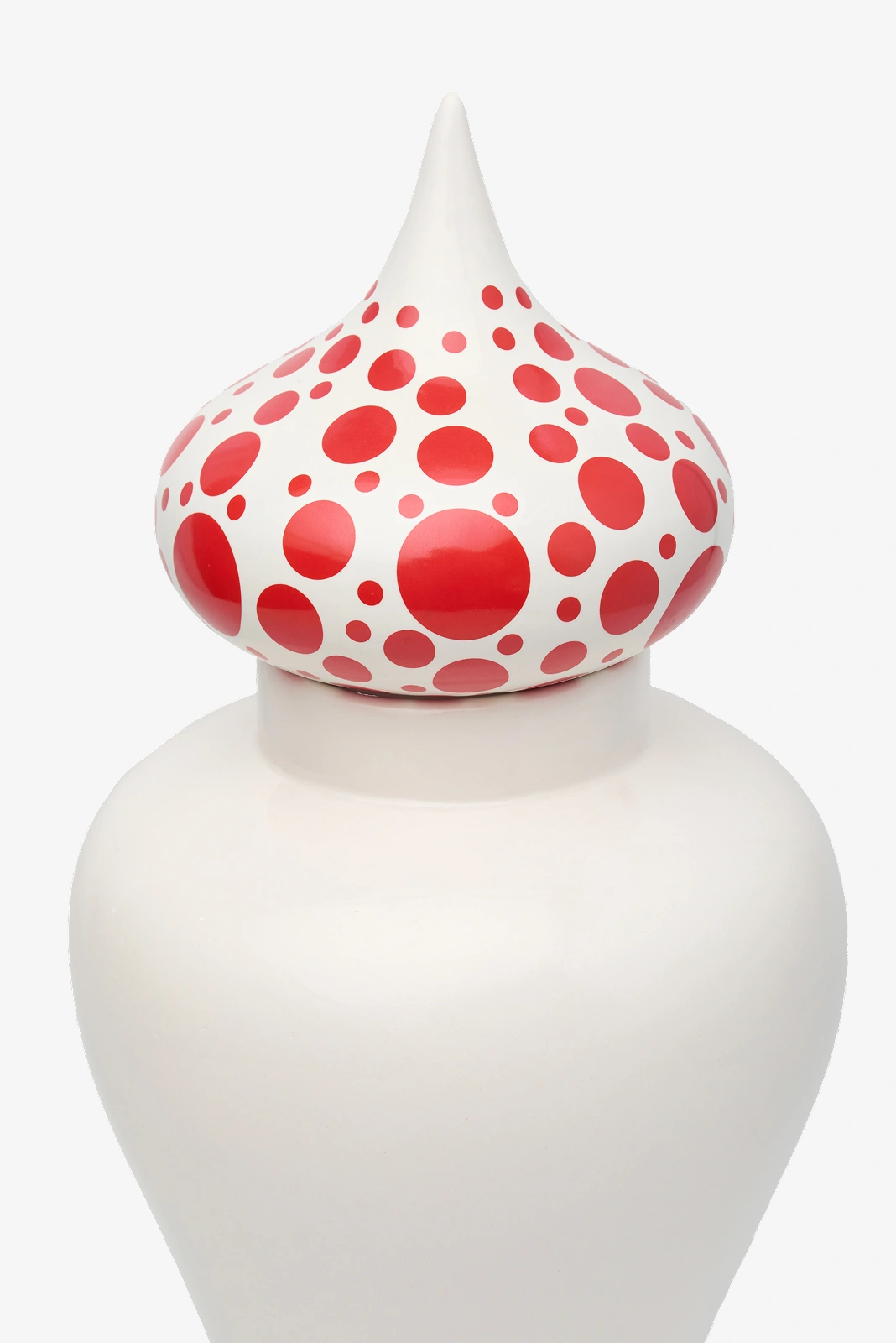 White vase with a pointed lid decorated with various sizes of red polka dots.