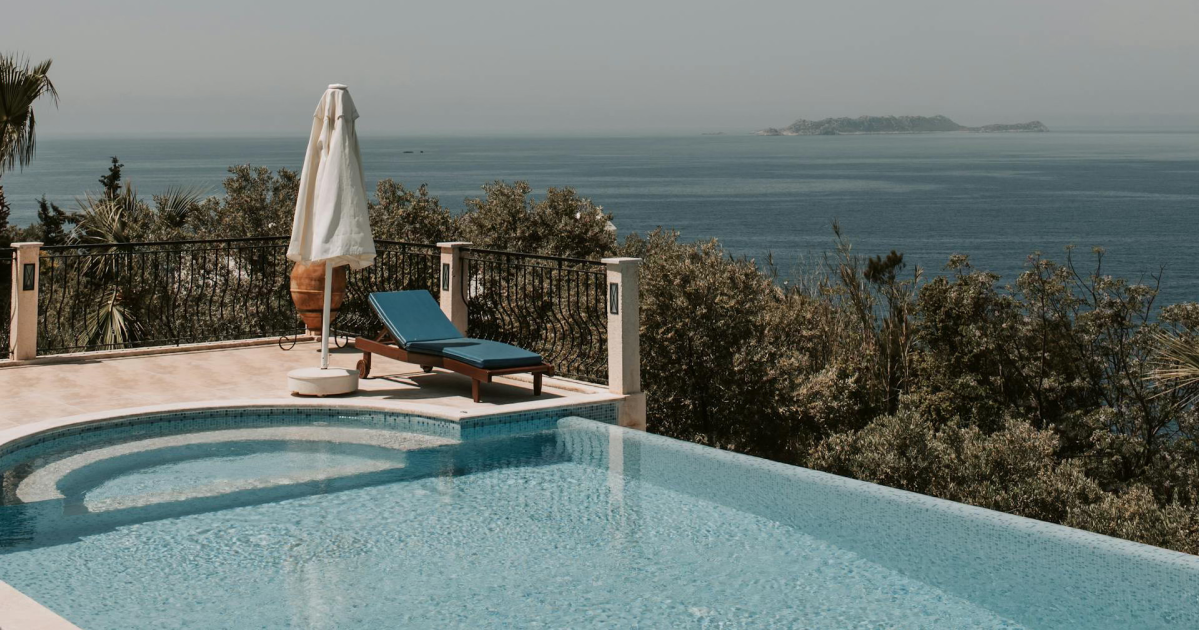 image of a nice house with swimming pool and sea views.