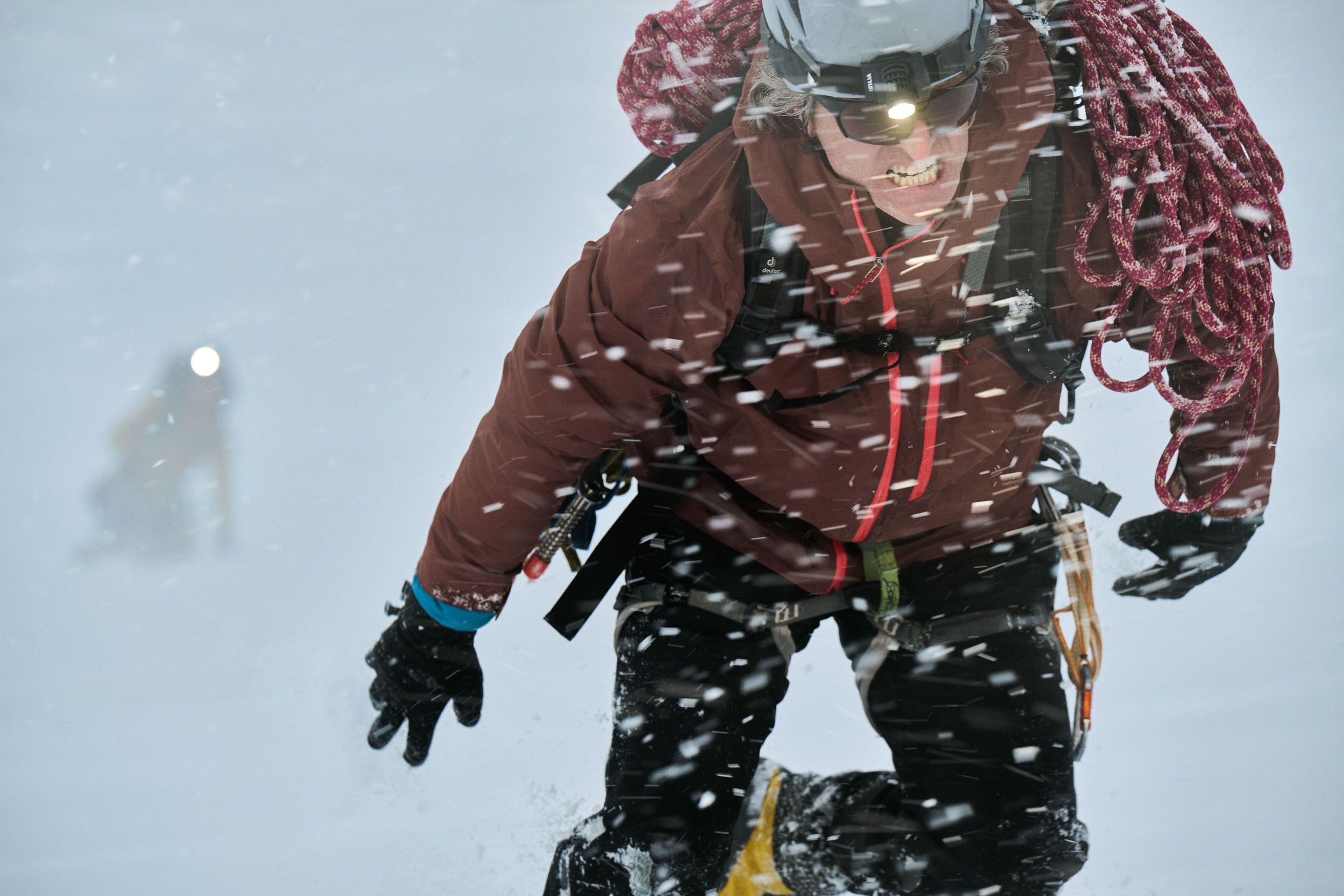 Person walking through snow blizzard