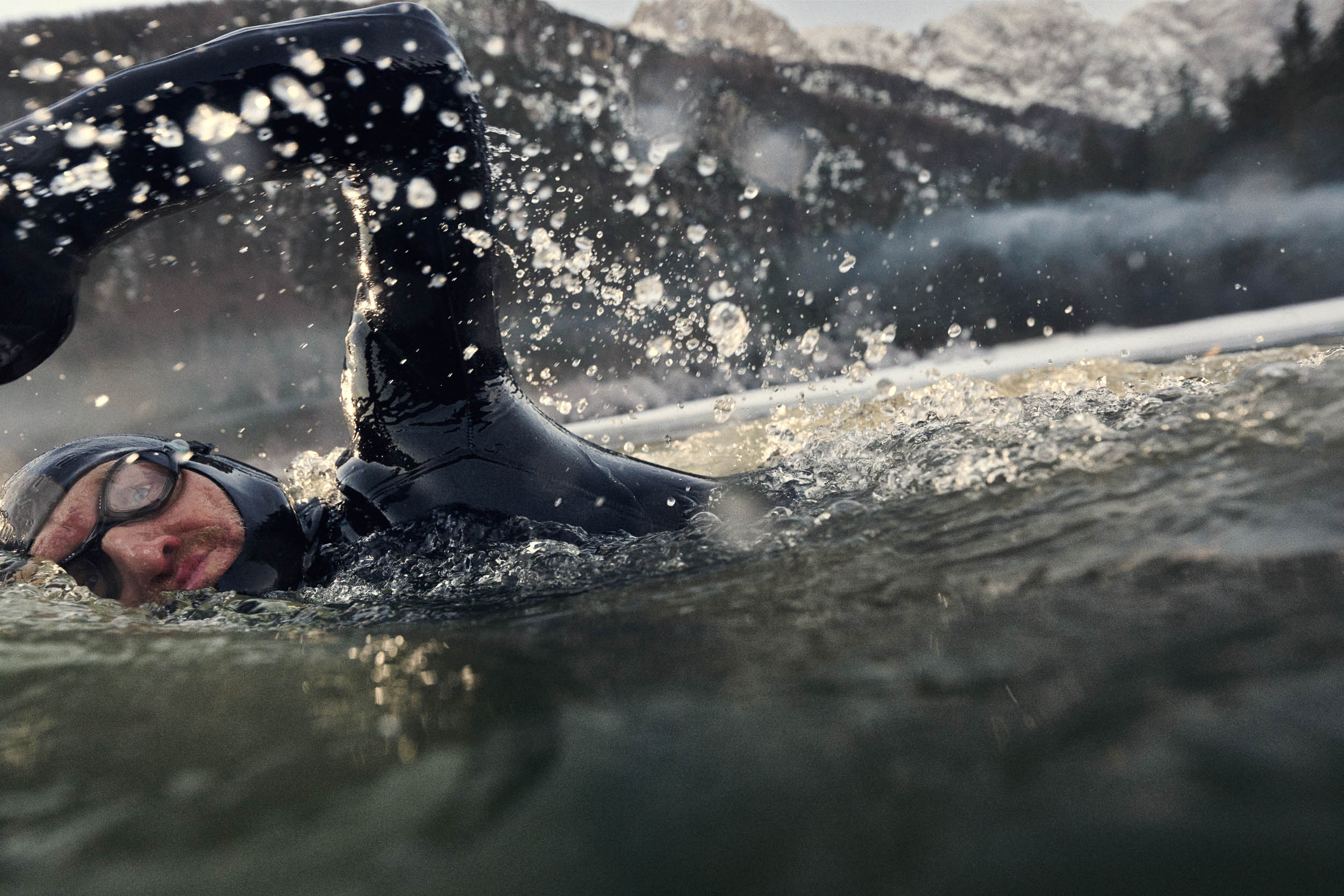 Person swimming up close action shot